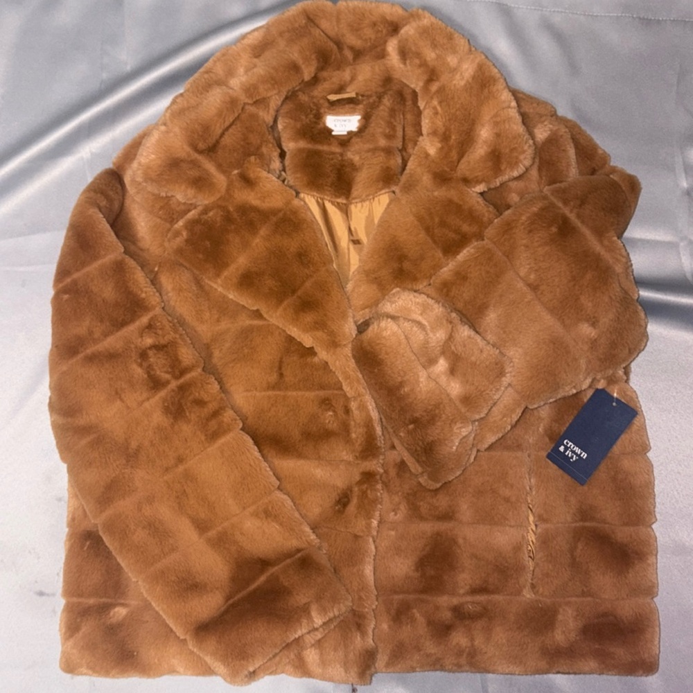 Crown and Ivory brownish tan fur coat. Never been worn. Still has tag